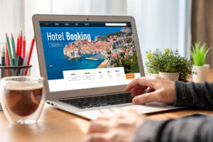 Image of person booking a hotel